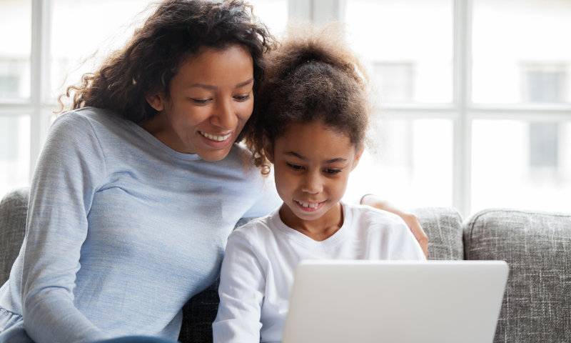 A mother and daughter learning about clear aligners