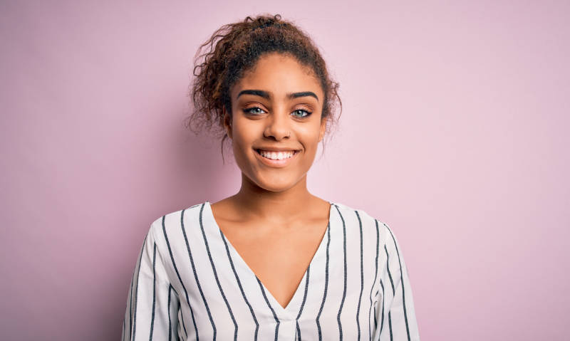 Woman smiling with invisible braces